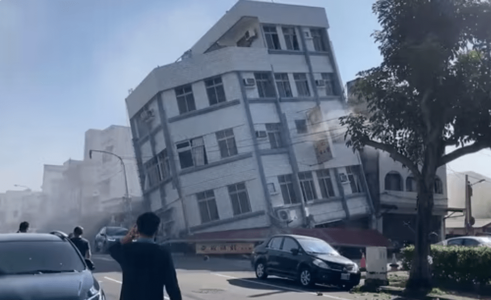 In this image taken from a video footage run by TVBS, a partially collapsed building is seen in Hualien, eastern Taiwan on Wednesday